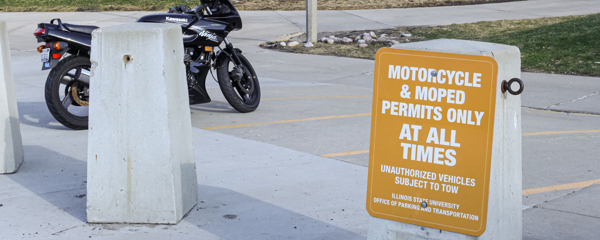 Photo of Motorcycle/Moped parking sign.