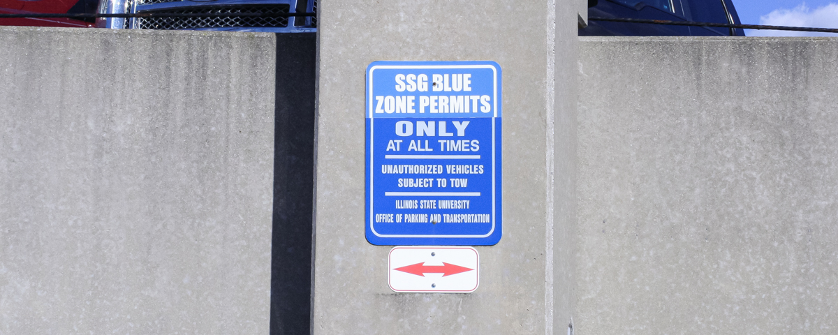 Photo of blue Resident parking sign.